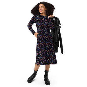 A person wearing a NerdyKeppie Engraved Bats Genderfluid Pride Long Sleeve Midi Dress With Pockets. 