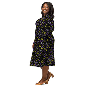 A person wearing a NerdyKeppie Engraved Bats Non-Binary Pride Long Sleeve Midi Dress With Pockets. 