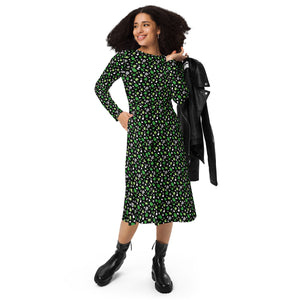 A person wearing a NerdyKeppie Raveyard Ghosts Aro Pride Long Sleeve Midi Dress With Pockets. 