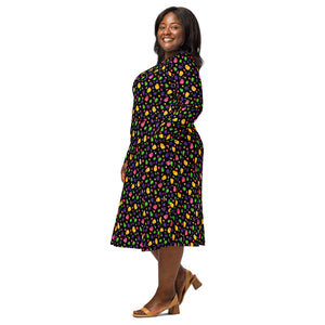 A person wearing a NerdyKeppie Raveyard Ghosts Lesbian Pride Long Sleeve Midi Dress With Pockets. 