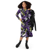 A person wearing a NerdyKeppie Splatter Wave Non-Binary Pride Long Sleeve Midi Dress With Pockets. 