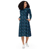 A person wearing a NerdyKeppie Wolf Pack Gay Men's Pride Long Sleeve Midi Dress With Pockets. 