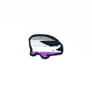 NerdyKeppie's Ace Crocodile Embroidered Pride Patch are shaped like their namesake and stitched on black duck cloth!