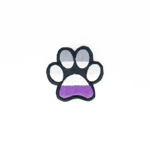 NerdyKeppie's Ace Dog Paw Embroidered Pride Patch are shaped like their namesake and stitched on black duck cloth!