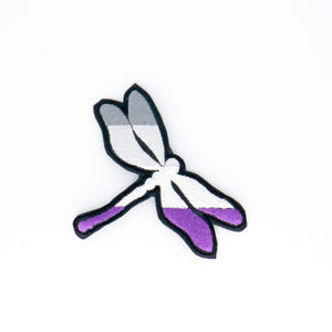 NerdyKeppie's Ace Dragonfly Embroidered Pride Patch are shaped like their namesake and stitched on black duck cloth!