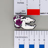 NerdyKeppie Proud to the Bone Cave Bear Skull Pride Enamel Pins. A Cave Bear skull pride enamel pin for our Proud to the Bone project. This prehistoric pin is wearing an adorable crown of flowers!
