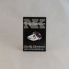 NerdyKeppie Proud to the Bone Possum Skull Pride Enamel Pins. A possum skull pride enamel pin for our Proud to the Bone project, wearing an adorable crown of flowers!