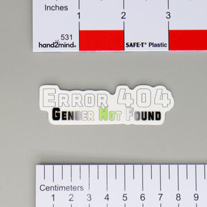 NerdyKeppie Error 404 Gender/Sexuality Not Found Sticker. A NerdyKeppie matte sticker reading your choice of "Error 404 Gender Not Found" or "Error 404 Sexuality Not Found". This pride sticker ships from Portland, Oregon.