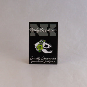NerdyKeppie Proud to the Bone Bat Skull Pride Enamel Pins. A vampire bat skull pride enamel pin for our Proud to the Bone project, wearing an adorable crown of flowers!