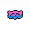 NerdyKeppie's BONEYARD Raccoon Embroidered Pride Patch are shaped like their namesake and stitched on black duck cloth!
