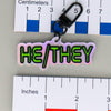 NerdyKeppie-BONEYARD Space Font Pronoun Keychain-He/Him