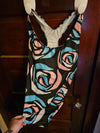 A person wearing a NerdyKeppie BONEYARD Trans Pride Stencil Roses Pride Tank Swimsuit Without Skirt - 2X. A pair of joggers with two deep pockets, its Neon Tarot pattern is in non-binary or genderfluid flag colors. These pride jogger sweatpants have a relaxed fit in the waist, hips, and thighs.