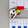 NerdyKeppie Proud to the Bone Sabertooth Tiger Skull Pride Enamel Pins. A Sabertooth Tiger skull pride enamel pin for our Proud to the Bone project, a perfect prehistoric gift for your favorite nerd. This prehistoric pin wears an adorable flower crown!
