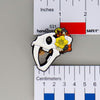 NerdyKeppie Proud to the Bone Sabertooth Tiger Skull Pride Enamel Pins. A Sabertooth Tiger skull pride enamel pin for our Proud to the Bone project, a perfect prehistoric gift for your favorite nerd. This prehistoric pin wears an adorable flower crown!