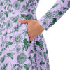 A person wearing a NerdyKeppie Bees Bees Bees Early Spring Long Sleeve Midi Dress With Pockets. 