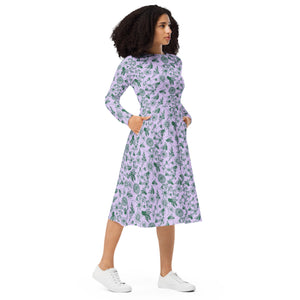 A person wearing a NerdyKeppie Bees Bees Bees Early Spring Long Sleeve Midi Dress With Pockets. 