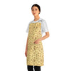 A person wearing a NerdyKeppie Bees Bees Bees Late Summer Apron With Pocket. 