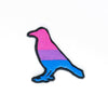 NerdyKeppie's Bi Crow Embroidered Pride Patch are shaped like their namesake and stitched on black duck cloth!
