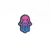 NerdyKeppie's Bi Hamsa Embroidered Pride Patch are stitched on black duck cloth and backed by sturdy vinyl fuse.