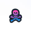 NerdyKeppie's Bi Skull And Crossbones Embroidered Pride Patch are stitched on black duck cloth and backed by sturdy vinyl fuse.