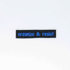NerdyKeppie's Blue "Organize and Resist" Embroidered Patch are stitched on sturdy rectangular duck cloth and backed with vinyl fuse.