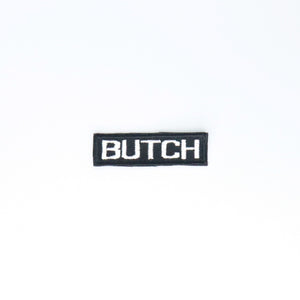 NerdyKeppie's "Butch" Embroidered Butch Pride Patch are stitched on black duck cloth and backed by sturdy vinyl fuse.