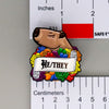 NerdyKeppie Capybara Enamel Rainbow Gay Pride Pronoun Pins. Our enamel pin features an adorable capybara, a paper scroll with nine different pronoun choices, and flowers in rainbow gay pride colors. This pride pin ships from Portland, Oregon.
