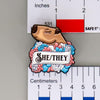 NerdyKeppie Capybara Enamel Trans Pride Pronoun Pins. Our enamel pin features an adorable capybara, a paper scroll with eight different pronoun choices, and flowers in transgender pride colors. This pride pin ships from Portland, Oregon.
