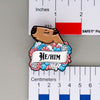 NerdyKeppie Capybara Enamel Trans Pride Pronoun Pins. Our enamel pin features an adorable capybara, a paper scroll with eight different pronoun choices, and flowers in transgender pride colors. This pride pin ships from Portland, Oregon.