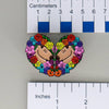 NerdyKeppie Capybara Hearts Spirit of '77 Pride Enamel Pins. Our Capybara Hearts Spirit of '77 Pride Enamel Pins feature a cute capybara surrounded by flowers in Spirit of '77 Pride colors and ship from Portland, Oregon USA.
