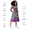 A person wearing a NerdyKeppie Carina Nebula Ace Pride Long Sleeve Midi Dress With Pockets. 