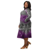 A person wearing a NerdyKeppie Carina Nebula Ace Pride Long Sleeve Midi Dress With Pockets. 