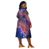 A person wearing a NerdyKeppie Carina Nebula Genderfluid Pride Long Sleeve Midi Dress With Pockets. 