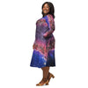 A person wearing a NerdyKeppie Carina Nebula Genderfluid Pride Long Sleeve Midi Dress With Pockets. 