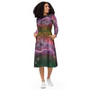 A person wearing a NerdyKeppie Carina Nebula Lesbian Pride Long Sleeve Midi Dress With Pockets. 