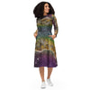 A person wearing a NerdyKeppie Carina Nebula Pan Pride Long Sleeve Midi Dress With Pockets. 