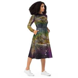 A person wearing a NerdyKeppie Carina Nebula Pan Pride Long Sleeve Midi Dress With Pockets. 