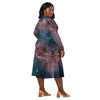 A person wearing a NerdyKeppie Carina Nebula Trans Pride Long Sleeve Midi Dress With Pockets. 