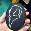 NerdyKeppie's Crow Skull Embroidered Halloween Patch are shaped like their namesake and stitched on black duck cloth!