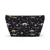 NerdyKeppie Dino Bones Queer Pride Zipper Pouch with T-Bottom. A zippered accessory/makeup bag featuring a t-bottom and a Dino Bones pattern in queer pride colors. This pride zipper pouch is fully lined and comes in two sizes.