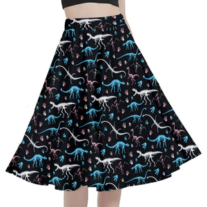 A person wearing a NerdyKeppie Dino Bones Trans Pride Full Circle Skirt CLOSEOUT. 