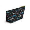 NerdyKeppie Dino Bones Trans Pride Zipper Pouch with T-Bottom. A zippered accessory/makeup bag featuring a t-bottom and a Dino Bones pattern in trans pride colors. This pride zipper pouch is fully lined and comes in two sizes.