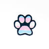 NerdyKeppie's Dog Paw Embroidered Pride Patch are shaped like their namesake and stitched on black duck cloth!