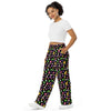 A person wearing a NerdyKeppie Dog Paws Lesbian Pride Unisex Wide-Leg Pants With Pockets. 