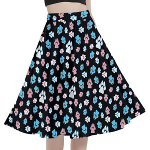 A person wearing a NerdyKeppie Dog Paws Trans Pride Full Circle Skirt CLOSEOUT. 