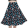 A person wearing a NerdyKeppie Dog Paws Trans Pride Full Circle Skirt CLOSEOUT. 