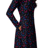 A person wearing a NerdyKeppie Engraved Bats Bi Pride Long Sleeve Midi Dress With Pockets. 