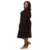 A person wearing a NerdyKeppie Engraved Bats Halloween Long Sleeve Midi Dress With Pockets. 
