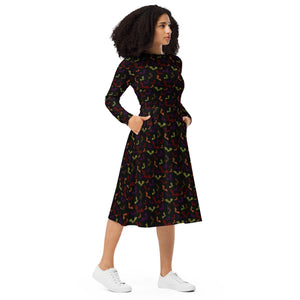 A person wearing a NerdyKeppie Engraved Bats Halloween Long Sleeve Midi Dress With Pockets. 