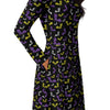 A person wearing a NerdyKeppie Engraved Bats Non-Binary Pride Long Sleeve Midi Dress With Pockets. 